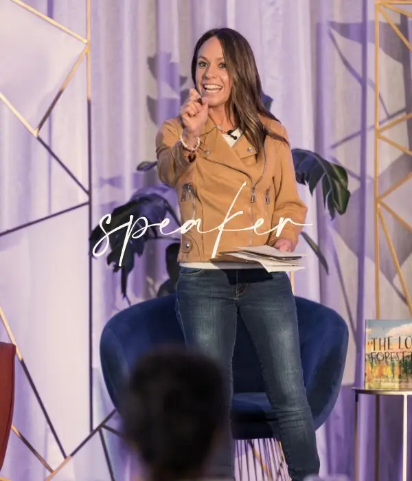 Amber Vilhauer speaking on the stage